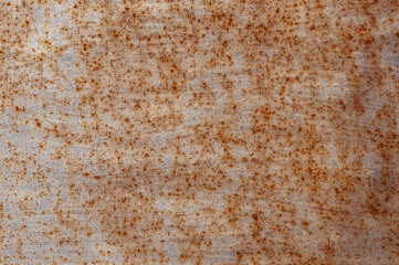 Gray metal sheet with rust stains