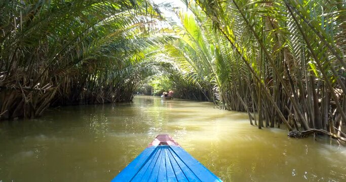 View of a Local Boat  in the Mekong Delta River canals