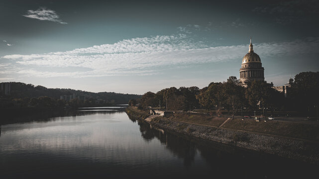 Serene Riverfront View Of West Virginia State Capitol