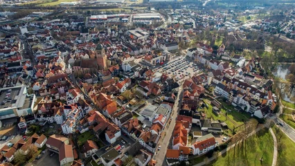 Deurstickers Aerial around the old town of Bad Hersfeld in Germany on a sunny morning in autumn © Simona