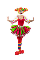 Funny female clown. Entertainer woman Joker in colorful suit and wig. Buffoon with clown whiteface makeup. Trickster, jester, pantomime, mime. Professional actor