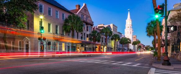 Fototapeta premium Uban streets in Downtown Charleston, South Carolina, United States. Vibrant sunrise twilight