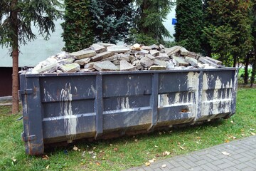 A container with demolition concrete rubble