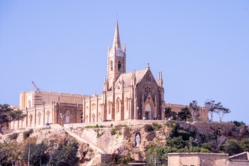 Fototapeta na wymiar Church of Holy Mother Lurdskayain Mgarr on the small island of Gozo - Malta
