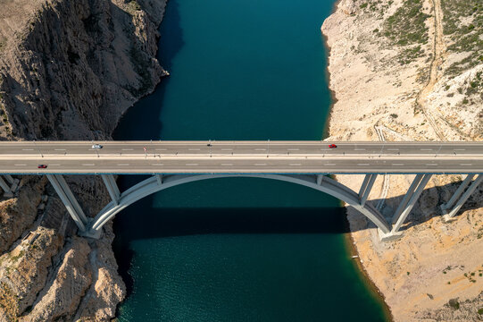 Aerial view of Maslenicki Most bridge, modern bridge crossing a scenic river in Zadar, Croatia.