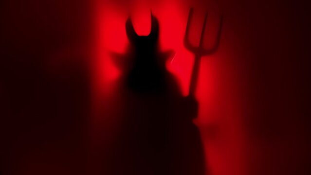 A sinister figure with a trident emerges from a smoky haze