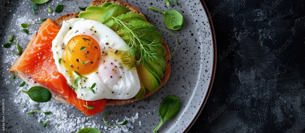 Aufkleber Toast with salmon poached egg and avocado on a white plate Poached egg with salmon and guacamole on rye bread. with copy space image. Place for adding text or design