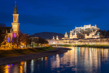 The old town of Salzburg with the Mozart bridge over the river Salzach, the Hohensalzburg Fortress and the Cathedral - obrazy, fototapety, plakaty