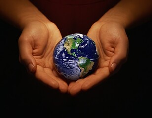 Mini Planet Earth in female hands. For posters, cards and prints. Ecology, nature, peace concept.