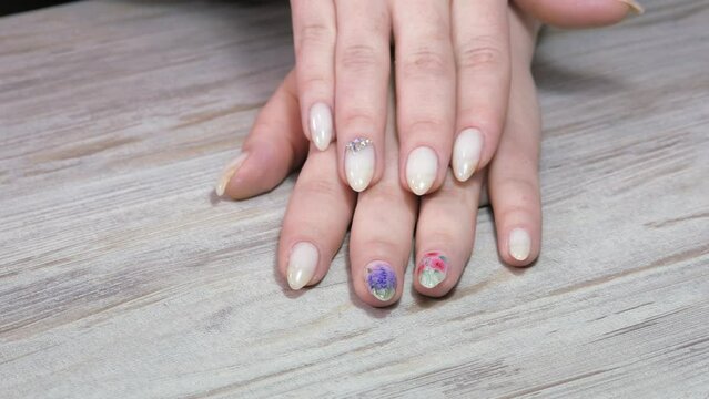 Samples of the nail pattern. Manicure samples on well-groomed hands and nails.