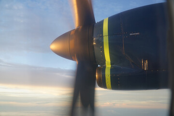Rotating propellers of an AZUL ATR 72 turboprop airplane over the Amazon rainforest. Flight from...