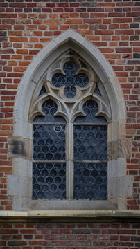 Outside view of the stained glass window of a German church from the outside. High quality photo