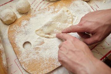 Preparation of dough for cheburek by molding