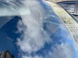 Cracks in a broken car windshield