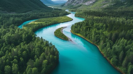 Obraz na płótnie Canvas Aerial View of a Serpentine Turquoise River Flowing Through Pine Forests with Mountain Peaks in the Background, Innlandet County, Norway