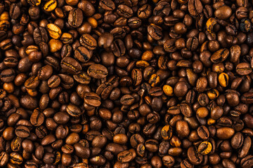 Coffee beans background. Texture of coffee beans. Background made of coffee beans