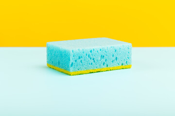 Sponge for washing dishes on a light background