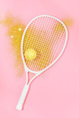 A tennis racket with a tennis ball adorned with golden glitter shining against a pink background. Sport aesthetic sparkling summer concept.