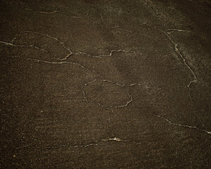 Worn out and cracked old asphalt. Detail shot. - 743154553
