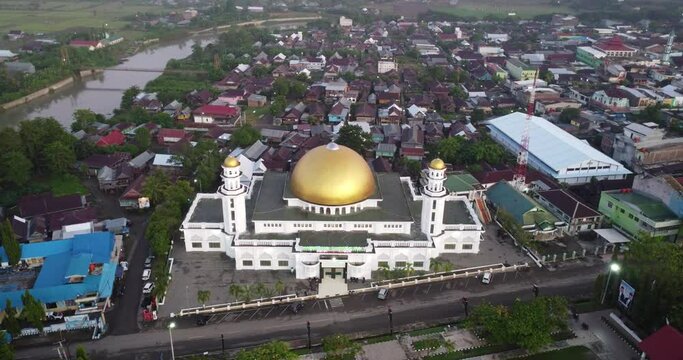 Sulawesi, Indonesia - November 08 2022 : Aerial View of the Ummul Qurra mosque in the city center of Sengkang, Wajo, South Sulawesi