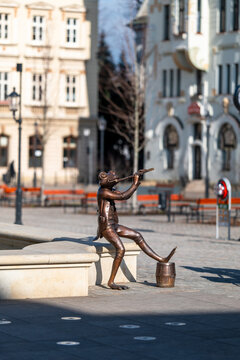 Bielsko-Biala, Poland - January 18, 2024: Bronze sculpture of a frog located on the Polish Army Square (Plac Wojska Polskiego). A nice and funny urban decoration reffering to the city's architecture.