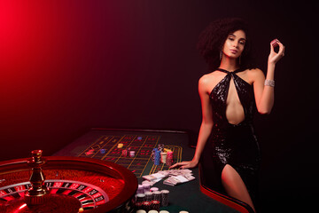 Photo of chic girl croupier in poker private club announce professional shark about winning holdem...