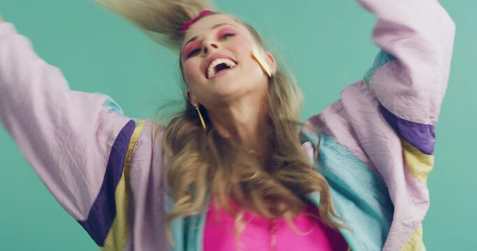 Happy, woman and aerobics exercise and dance with retro fashion in studio or green background. Fitness, portrait and person moving with energy in 80s workout for health and wellness in mock up space