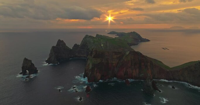 Amaizing landscape on Madeira island at sunrise in Atlantic ocean. The rocks of Madeira island cape at the eastern part of the island. Portugal