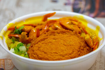 Brazilian acarajé traditional food of African origin in Bahia with vatapá caruru and dried shrimp