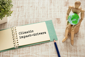 There is notebook with the word Climatic impact-drivers. It is as an eye-catching image.