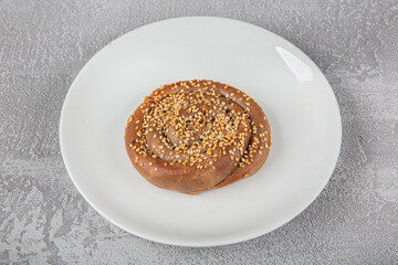 Gluten free food. Buckwheat flour rose pastry with sesame seeds. Homemade baked buns made of raw...