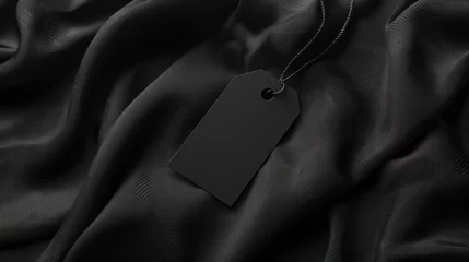 Fotobehang Clothing label on black garment, space for text © Ibad