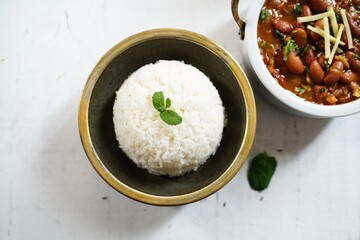 Cooked Thai Jasmine rice served with kidney beans curry