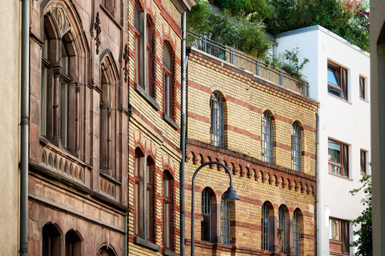 historic buildings next to new buildings in cologne's old town in the eigelstein quarter