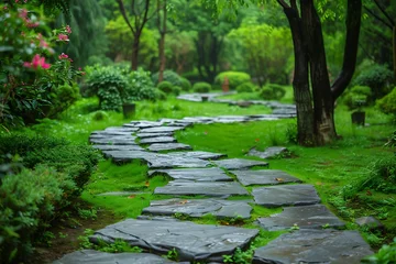 Raamstickers decorative stone path in a green garden or forest, landscape design of the area © Marina Shvedak