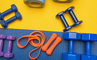 blue yellow fitness background with accessories