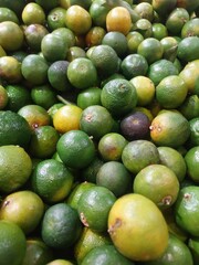 Lime Citrus Fruits In Fruit Market. Natural fresh limes.
