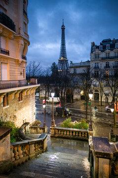 Staircase at night with Eiffel tower, Paris, France