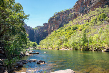rugged Outback scenery in the Northern Territory of Australia, showcasing vast deserts, red rocks,...
