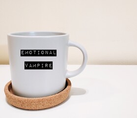 Coffee mug with text inscription Emotional Vampire - someone who gaslights, manipulates or use...