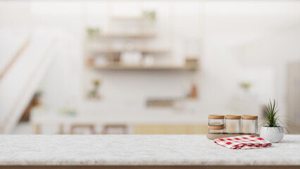 Empty space for display product on a tabletop in a modern white kitchen with a large kitchen island.