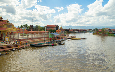 Fototapeta na wymiar Inle Lake City, The Floating village urban city town houses, lake sea or river. Nature landscape fisheries and fishing tools, Myanmar. Aquaculture farming