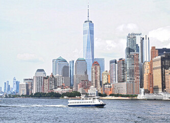 New York Skyline view from water during ferry ride over to Ellis Island.