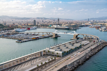 Aerial view of Barcelona city coastline with ships and architecture landmarks  - 743372340