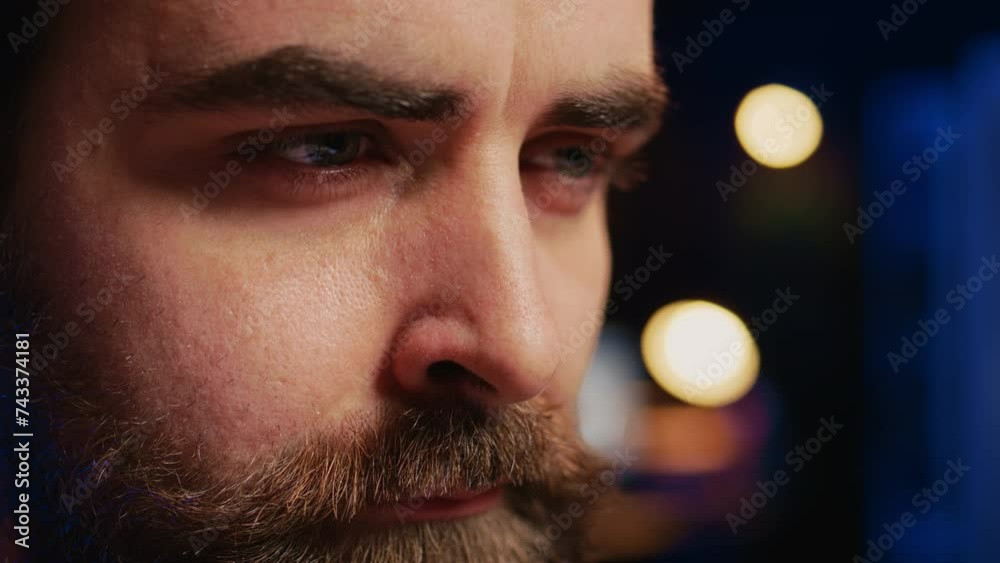 Poster developer in home office concentrating hard while doing coding on computer, extreme close up shot. f