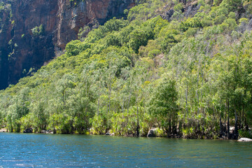 Explore the raw beauty of the Northern Territory's rugged Outback, where rocky terrain meets endless horizons in a mesmerizing landscape.