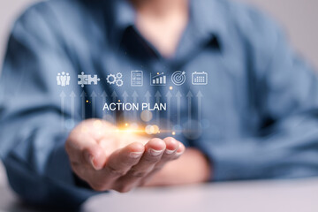 Action plan concept. Business and marketing, objective, strategy, Plan and implementation. Businessman holding action plan on virtual screen for Strategic, Vision, Planning and Direction.