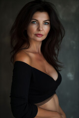 Fototapeta premium a sensual middle-aged woman, blue eyes, with dark hair front view portrait, beautiful skin