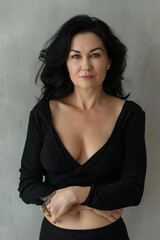 a sensual middle-aged woman, blue eyes, with dark hair front view portrait, beautiful skin