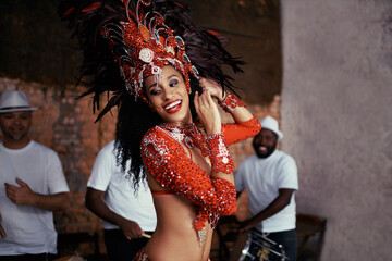 Dancer, samba and woman at carnival in celebration, music culture and happy band in Brazil. Dance,...